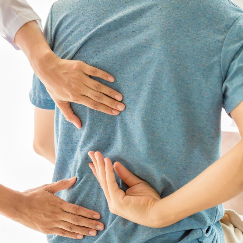 close-up-physiotherapist-working-with-patient-clinic